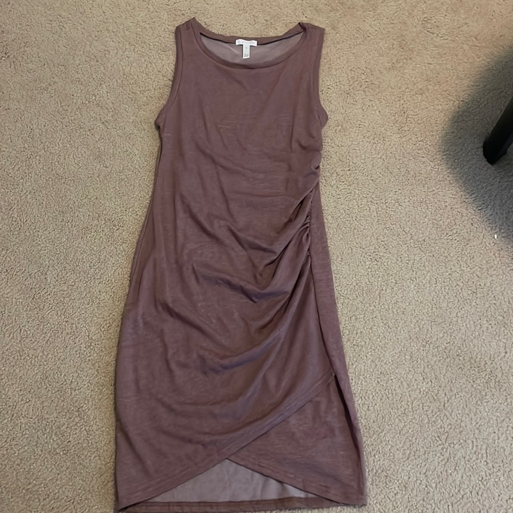 Soft, fitted, dusty rose colored dress.